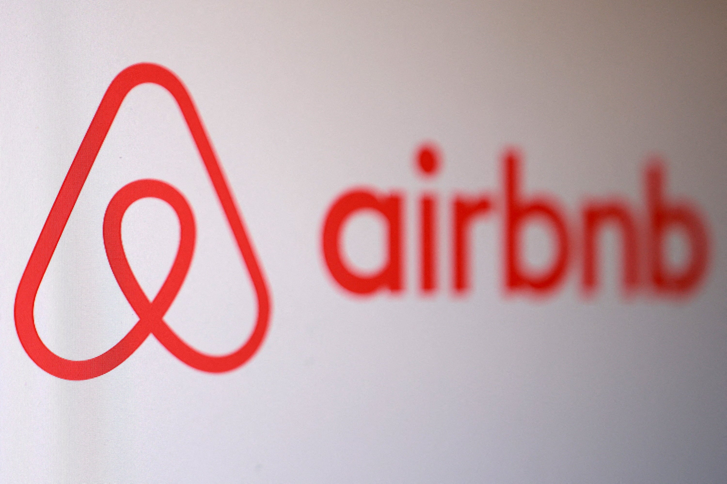 Illustration shows Airbnb logo