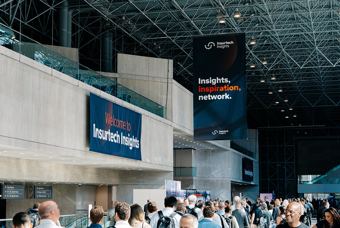 Insurtech Insights attendees and sign