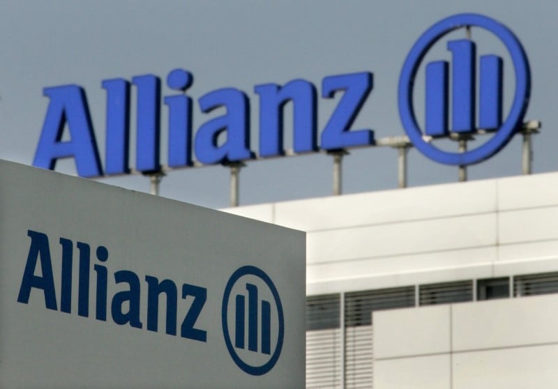 Allianz logos are pictured in front of the headquarter of Germany's largest insurance group Allianz ..